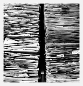 Two stacks of paper forms